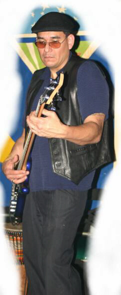 Robert Hot Rod Rodriguz - seen here laying down rock steady Bass Texas Blues rythms with the Roughcuts at the Stardust club in South Austin Texas